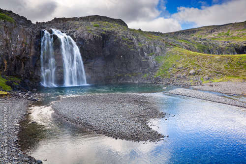 Fossfjörður waterfall in th...