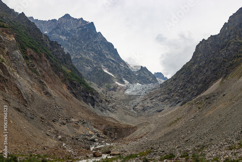 Chalaadi Glacier, Mestia, Svaneti, Georgia, beautiful glacier in the Caucasus mountains on a cloudy day photo