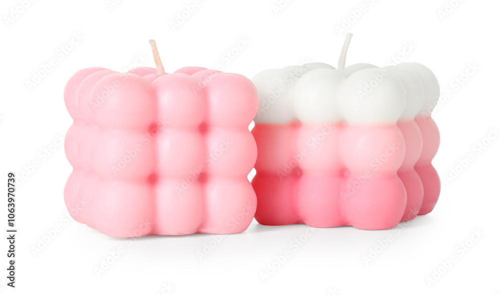 Obraz premium Two beautiful bubble candles isolated on white