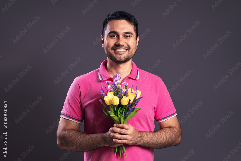 Portrait of Brazilian man wearing polo shirt in pink Portrait of Brazilian man wearing polo shirt in pink
