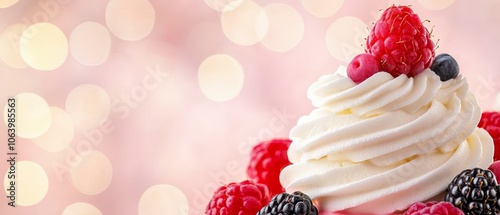  Cupcake topped with whipped cream and berries ..A cupcake crowned with whipped cream and adorned with ber