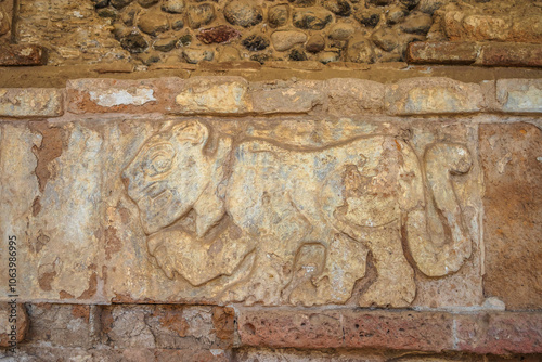 Pre-Hispanic stone engravings with animal figures in the archaeological zone of the pyramids of the Atlanteans, in Tula Hidalgo photo