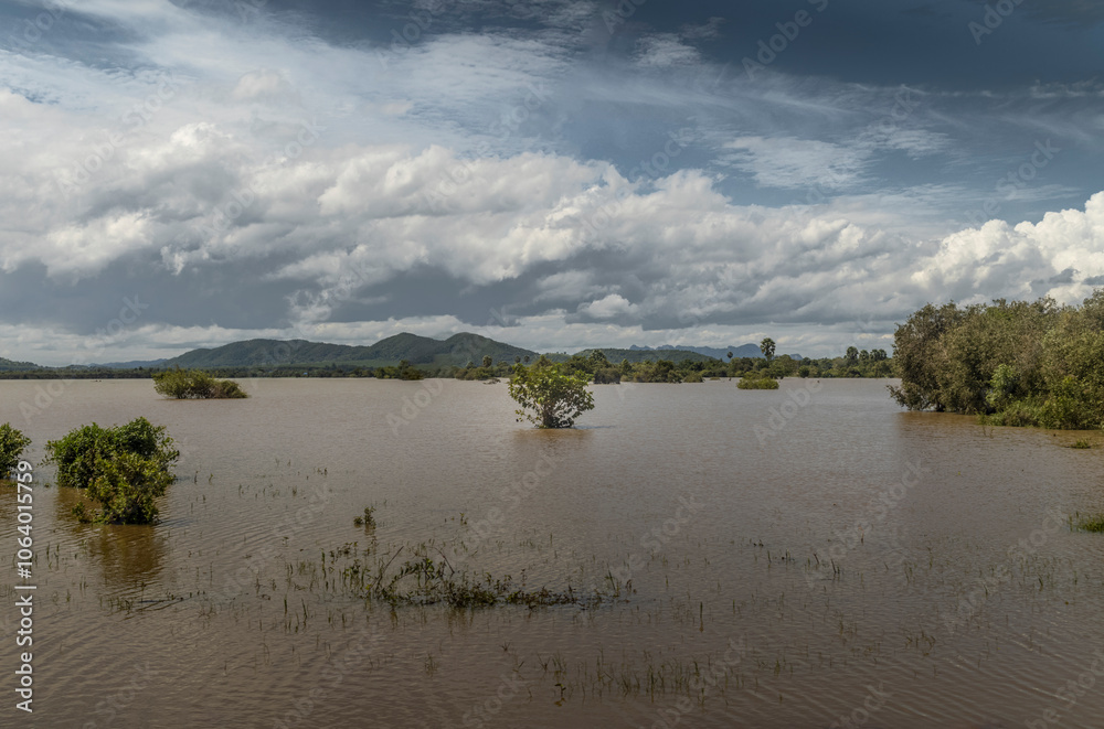 View of the calm waters of the Secret Lake in Kampot in Cambodia View of the calm waters of the Secret Lake in Kampot in Cambodia