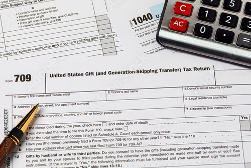 Gift tax form for filing income taxes. Gift tax exclusion, gift tax limit and income tax return concept.