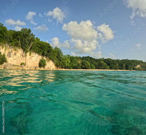 anse canot beach in Marie Galante, guadeloupe island, seen from caribbean turquoise sea with action camera. idyllic beach vacation destination photo