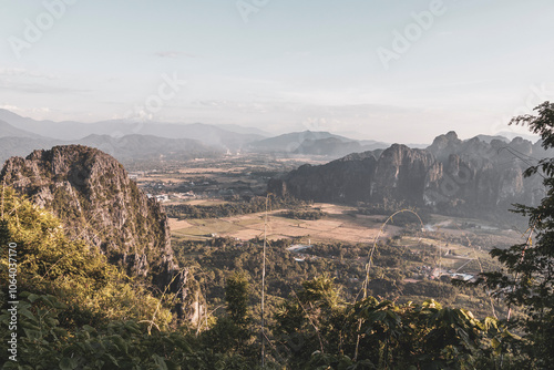 Mountain landscape with tropical jungle fields in Vang Vieng Laos.