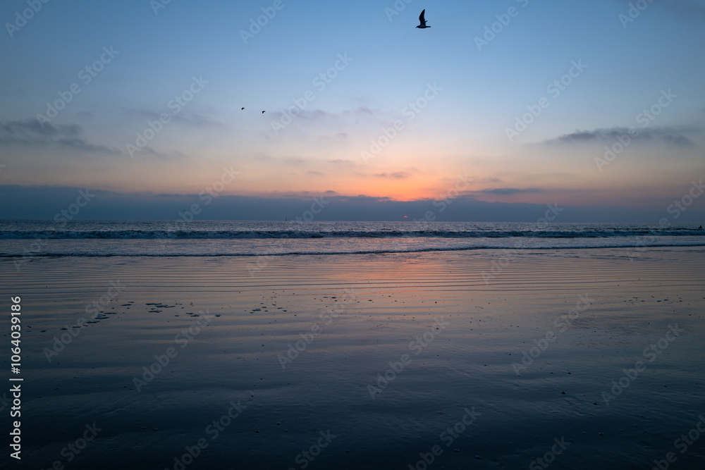 Sea beach with sunset sky abstract background, bermudas. Copy space of summer vacation and travel concept. Sea beach with sunset sky abstract background, bermudas. Copy space of summer vacation and travel concept.