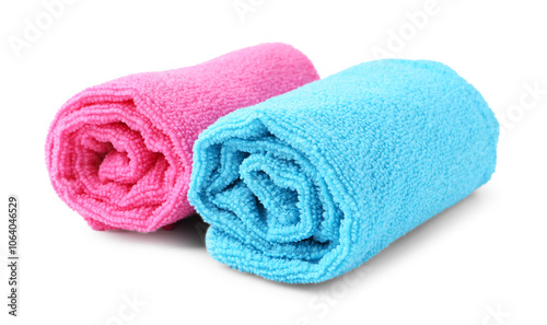 Clean pink and light blue microfiber cloths isolated on white