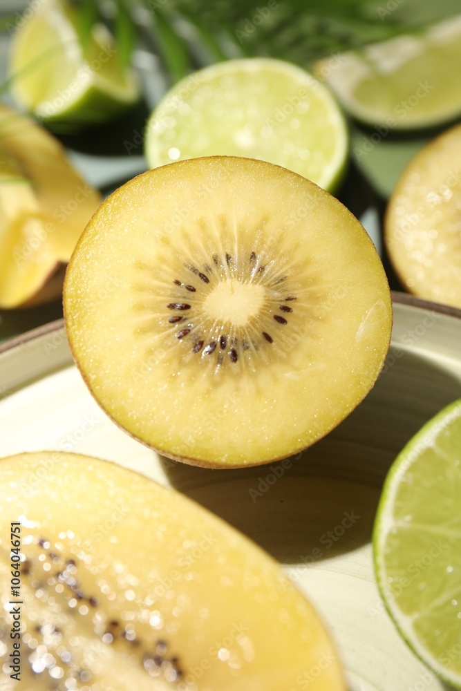 Pieces of delicious exotic fruits served on table, closeup Pieces of delicious exotic fruits served on table, closeup