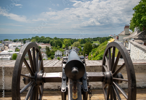 looking at mackinac shoreline over the barrel of a canon from fort mackinac