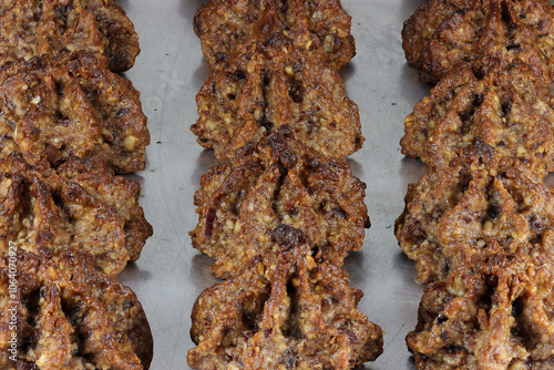 nut macaroons on aluminum baking tray