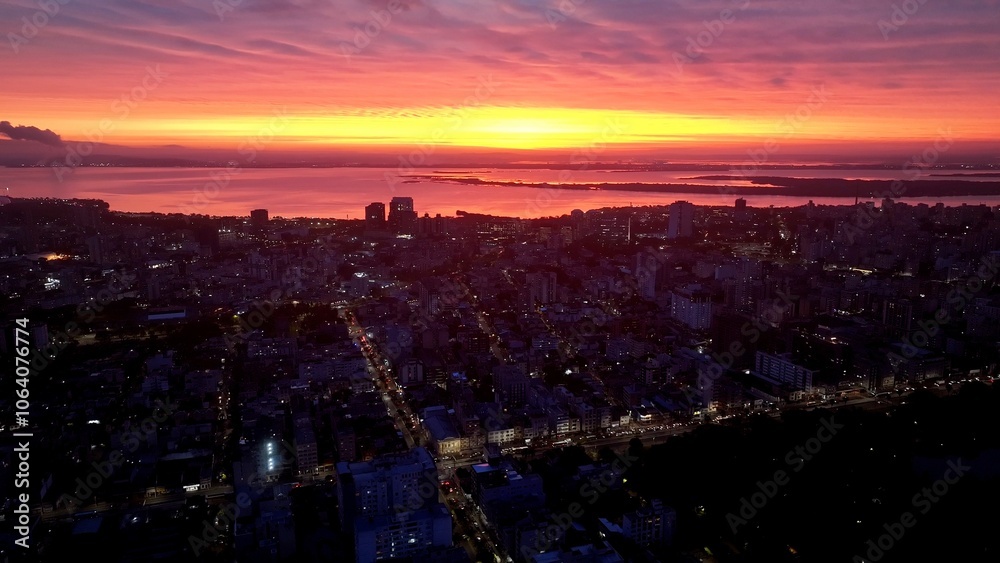 Fototapeta premium Sunset Skyline At Porto Alegre In Rio Grande Do Sul Brazil. Sunset Landscape. Downtown District. Highrise Buildings City Skyline. Sunset Skyline At Porto Alegre In Rio Grande Do Sul Brazil. 