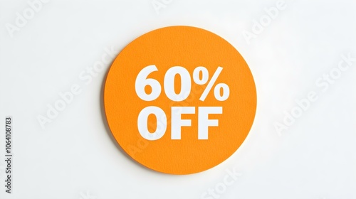 White '60% OFF' Text on a Light Orange Round Paper Note. White Background with Copy Space