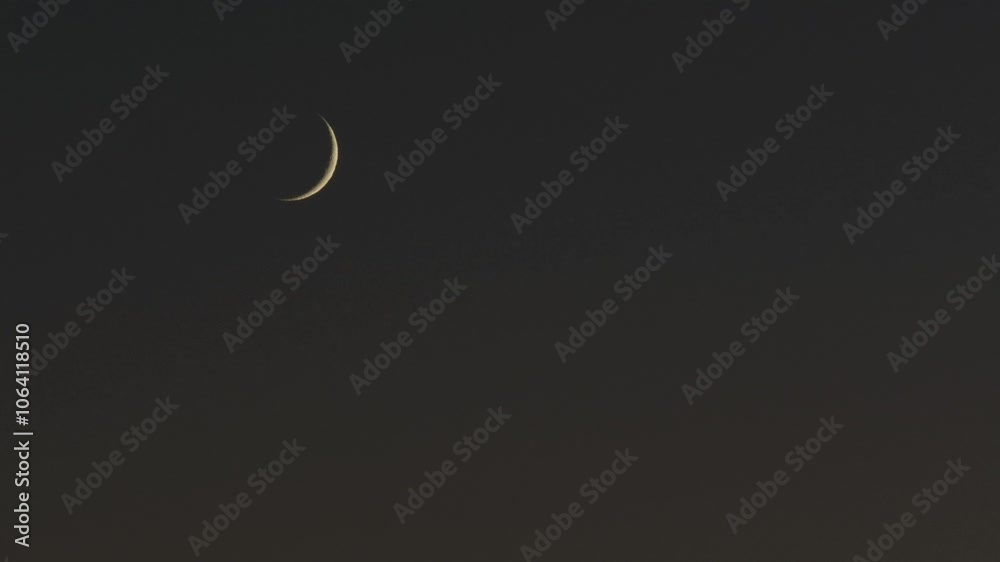 Tokyo,Japan - November 4, 2024: Crescent moon at dusk in autumn Tokyo,Japan - November 4, 2024: Crescent moon at dusk in autumn