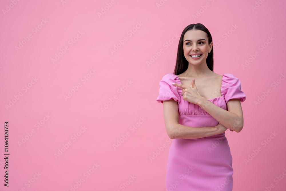 Excited young cute dark-haired young woman on a pink background Excited young cute dark-haired young woman on a pink background