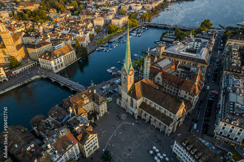 Beautiful aerial view of the city of Zurich in Switzerland - the Limmat River and its iconic churches, buildings rivers and Clockes. photo