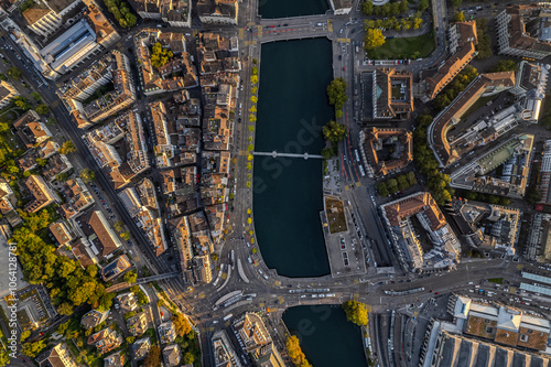 Beautiful aerial view of the city of Zurich in Switzerland - the Limmat River and its iconic churches, buildings rivers and Clockes. photo