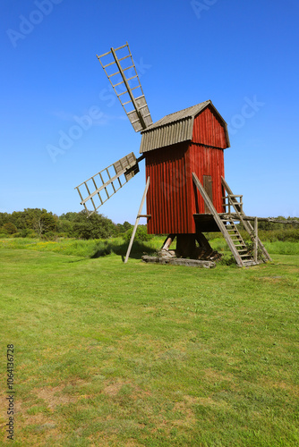Obraz na płótnie Traditional red painted windmill located in the Swedish province of Oland. w salonie