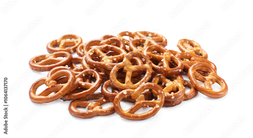 Many delicious pretzel crackers isolated on white Many delicious pretzel crackers isolated on white