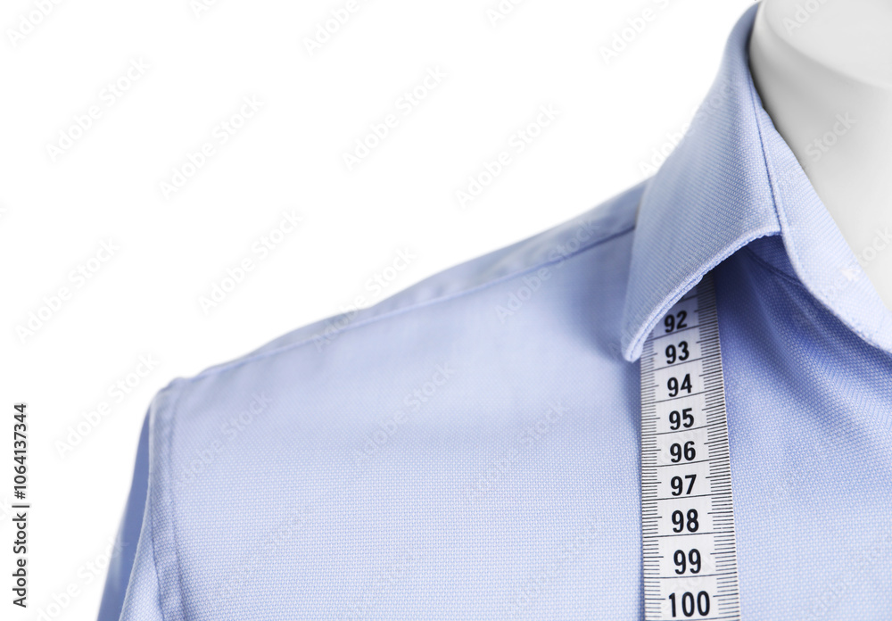 Mannequin with shirt and measuring tape isolated on white Mannequin with shirt and measuring tape isolated on white
