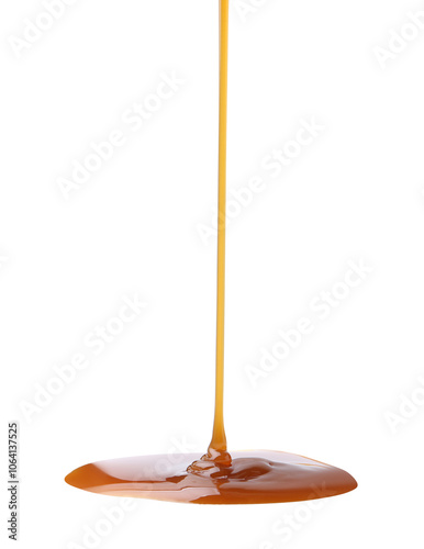 Tasty caramel sauce dripping on white background, closeup