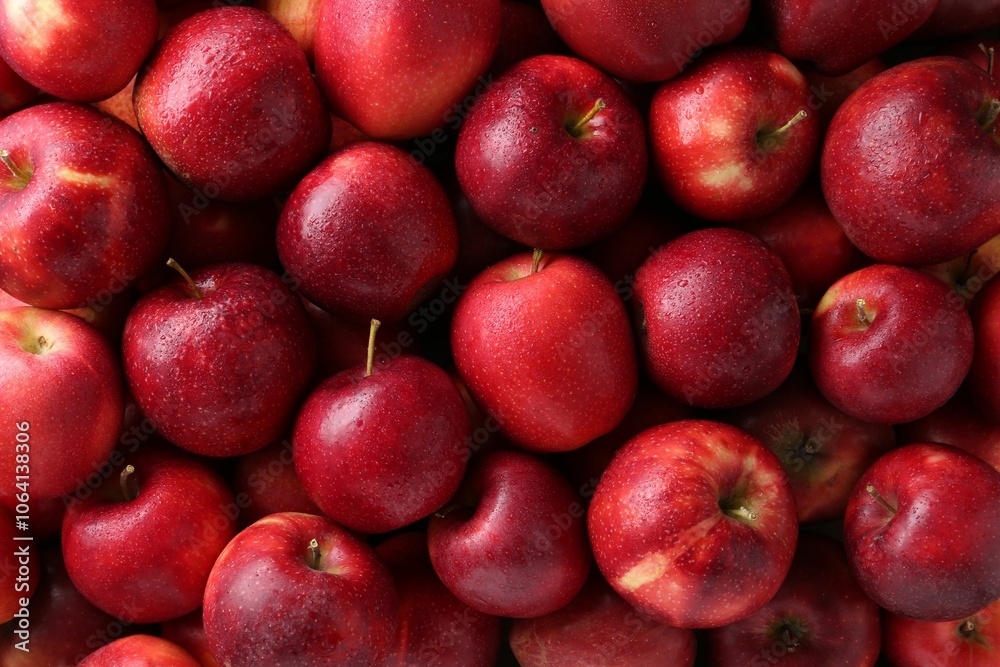 Naklejka premium Fresh ripe red apples as background, top view