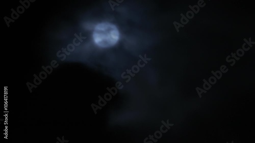 Moon through the clouds