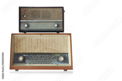 front view small old wooden brown and black radio on large old brown radio on white background, object, decor, fashion, copy space