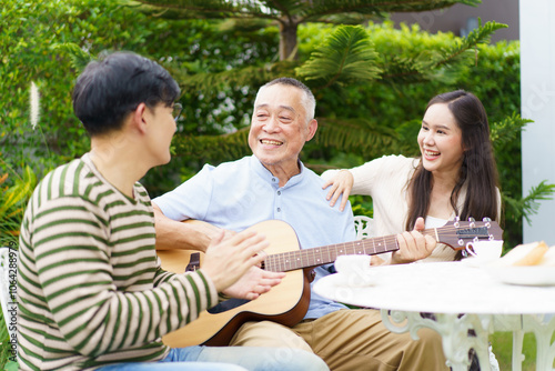 Happy multi-generation Asian family living together in weekend