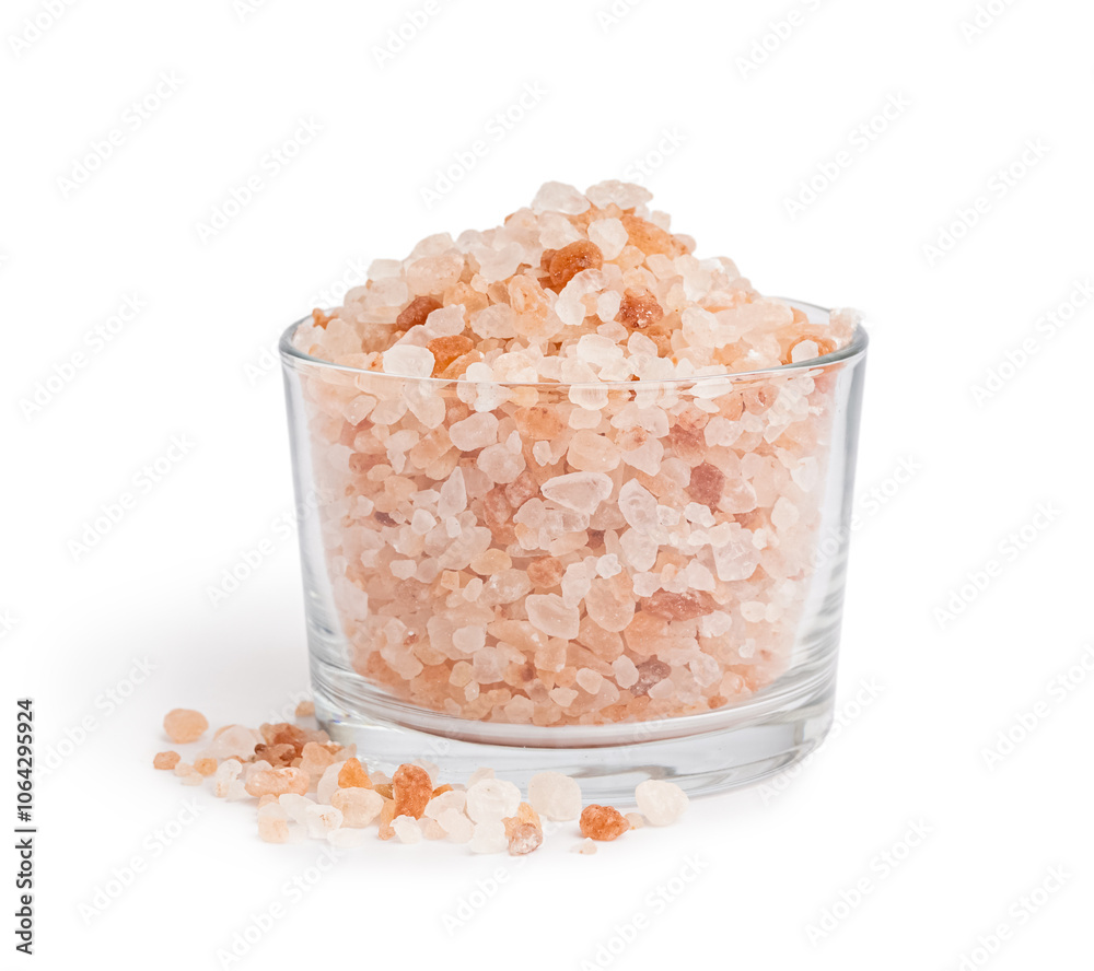 Glass bowl with Himalayan pink salt on white background Glass bowl with Himalayan pink salt on white background