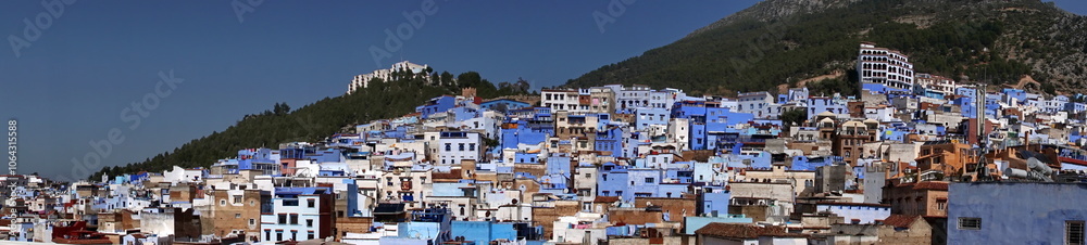 Fototapeta premium Panorama of the medina on the slopes of a mountain in Chefchaouen, Morocco