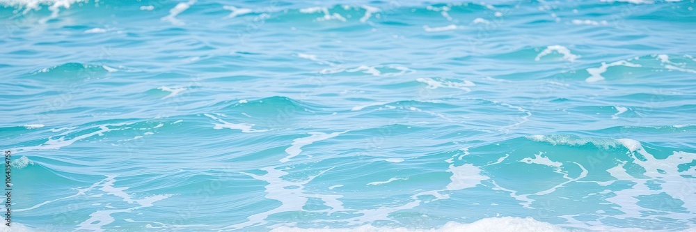 Obraz premium Close-up shot of pure blue turquoise ocean water with frothy foam and rolling waves, beauty, aqua, vacation