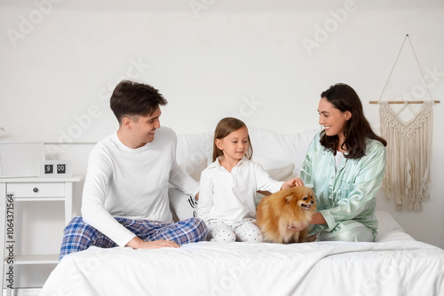 Little girl with her parent...