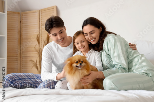 Little girl with her parent...