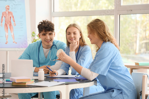 Medical students with jaw m...