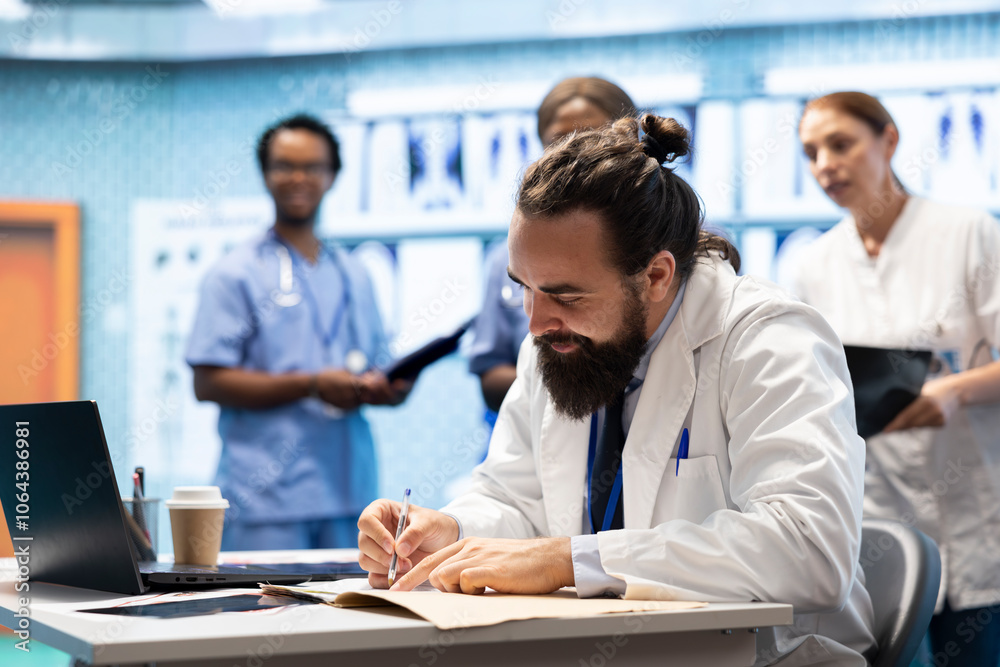 General practitioner writing a prescription for treatment plan at his desk, recommending medicine for disease prevention. Doctor consulting analytics and hospital records in a medical facility. General practitioner writing a prescription for treatment plan at his desk, recommending medicine for disease prevention. Doctor consulting analytics and hospital records in a medical facility.