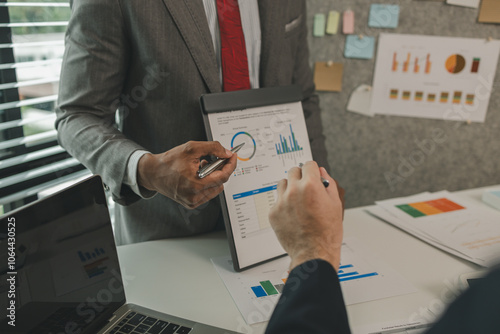 a businessman orders his assistant to rehearse a serious presentation of an important project and not to make any mistakes before a business meeting with a partner soon, brainstorming, discussion