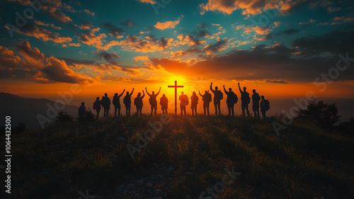 A group of people are standing on a hillside with a large cross in the middle of them