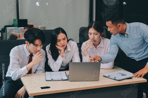 Frustrated upset multiracial business team people sad with bad work result in report disappointed in corporate bankruptcy failure crisis worried of paperwork problem sit at table at office meeting