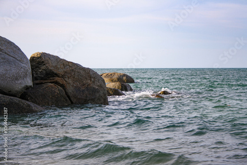 View of Penyusuk beach, a rocky beach in Bangka Belitung, Indonesia. Summer vacation concept photo