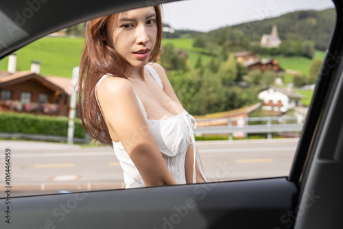 Wallpaper Mural Woman post in nature outside of the car view from window. Torontodigital.ca