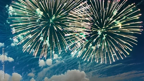 A vibrant display of fireworks explodes against a backdrop of a blue night sky filled with white clouds. Animation looping video background. Generated with AI