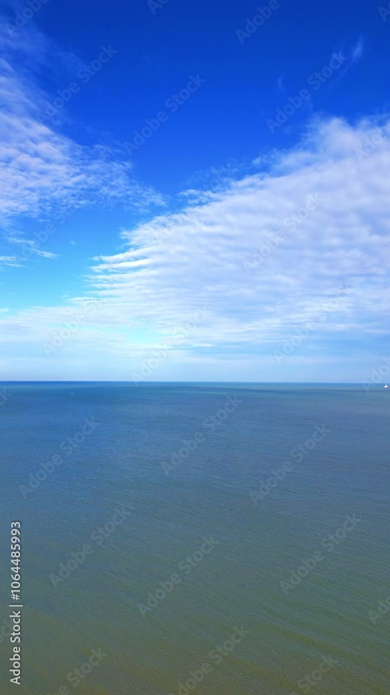 A tranquil view of the serene ocean and expansive sky, inspiring calmness, relaxation, and creativity A tranquil view of the serene ocean and expansive sky, inspiring calmness, relaxation, and creativity