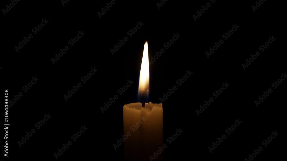 Single candle burning in the dark, providing a warm glow. The flame flickers gently, creating a peaceful and contemplative atmosphere Single candle burning in the dark, providing a warm glow. The flame flickers gently, creating a peaceful and contemplative atmosphere