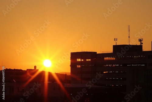 a hopeful sunrise over a hospital symbolizing new treatments