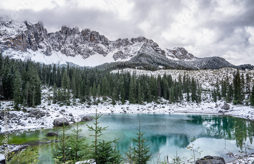 Fototapeta Naklejka Na Ścianę i Meble -  Karersee lake with snow in the Dolomites, Italy.