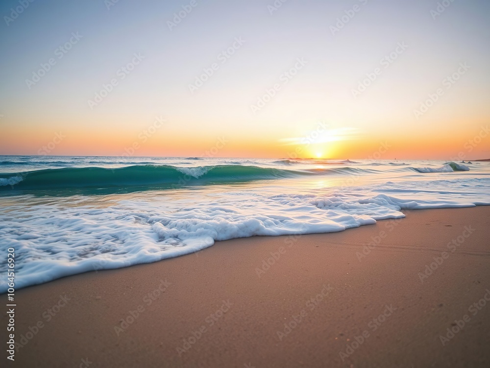 A soft blue ocean wave breaks on the shore of a tranquil fine sandy beach at sunset, creating a beautiful and serene scene, coastal scenery, natural beauty, shoreline A soft blue ocean wave breaks on the shore of a tranquil fine sandy beach at sunset, creating a beautiful and serene scene, coastal scenery, natural beauty, shoreline