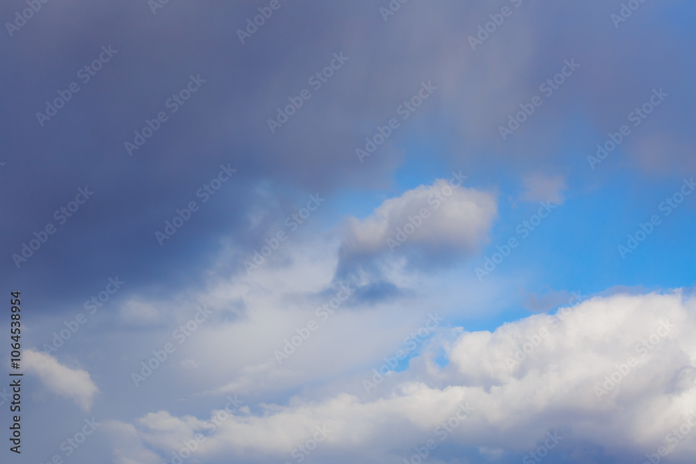 White heap clouds in the blue peaceful sky. The concept of psychological calmness and health. Peace of mind with the forces of nature. Air travel concept. White heap clouds in the blue peaceful sky. The concept of psychological calmness and health. Peace of mind with the forces of nature. Air travel concept.