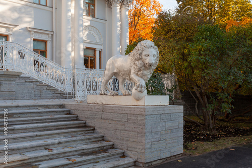 Cast metal statue of a lion at the entrance to the Yelagin Palace in St. Petersburg, Russia photo
