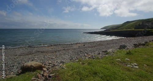 wide shot looking east of a rocky beach Cove at mull of Galloway, east Tarbet. photo